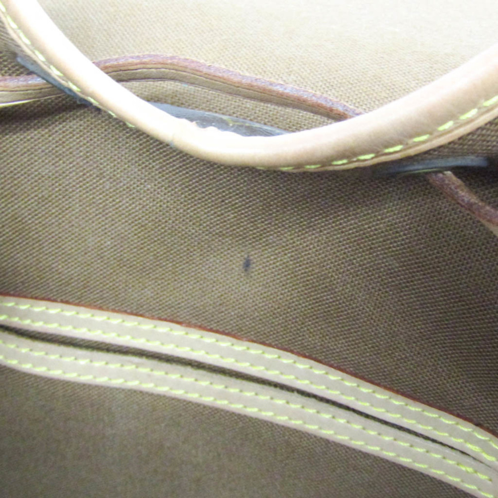 LOUIS VUITTON Brown Monogram Backpack - Picture 12 of 14